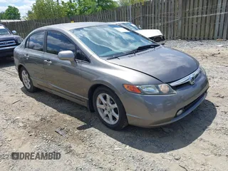 2006 Honda Civic LX with VIN 1HGFA16586L104230, listed as a IAAI auction lot 42215822 with 128,704 mi miles and . Bid and sale history available at DreamBid. Image 1.