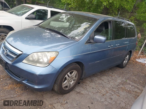 2005 Honda Odyssey EX-L with VIN 5FNRL38685B113633, listed as a IAAI auction lot 42035706 with 320,335 mi miles. Bid and sale history available at carsss.com. Image 2.