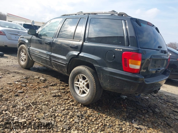 1999 Jeep Grand Cherokee Limited with VIN 1J4GW68S8XC588500, listed as a IAAI auction lot 41484787 with 161,961 mi miles. Bid and sale history available at carsss.com. Image 3.