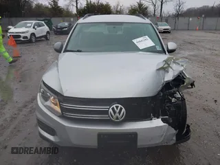 2017 Volkswagen Tiguan S with VIN WVGBV7AX4HK051172, listed as a IAAI auction lot 41843182 with 160,010 mi miles and . Bid and sale history available at DreamBid. Image 13.