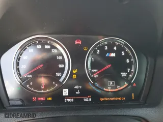 2018 BMW M2 with VIN WBS1J5C51JVD36522, listed as a Copart auction lot 61423854 with 57,933 mi miles and Salvage Title. Bid and sale history available at carsss.com. Image 9.