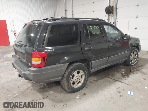 1999 Jeep Grand Cherokee Laredo with VIN 1J4GW58SXXC649579, listed as a IAAI auction lot 42365959 with 199,742 mi miles and . Bid and sale history available at DreamBid. Image 4.