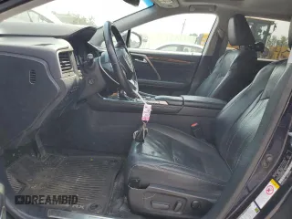 2018 Lexus RX 350 with VIN 2T2BZMCA6JC149235, listed as a Copart auction lot 59939505 with 214,676 mi miles and Salvage title. Bid and sale history available at DreamBid. Image 7.