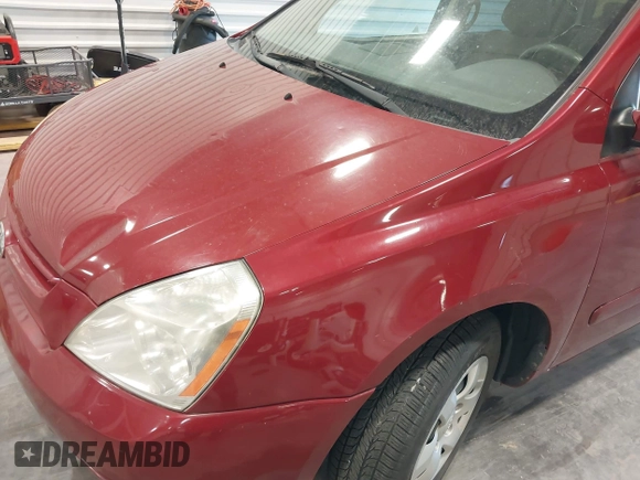 2010 Kia Sedona LX with VIN KNDMG4C35A6343380, listed as a IAAI auction lot 42042669 with 119,648 mi miles. Bid and sale history available at carsss.com. Image 13.