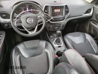 2015 Jeep Cherokee Trailhawk z VIN 1C4PJMBSXFW649425, wystawiony jako Copart lot #52900735 z przebiegiem 89 345 mil mil oraz Szkoda całkowita • Salvage title. Historia ofert i sprzedaży dostępna na DreamBid. Obrazek 8.