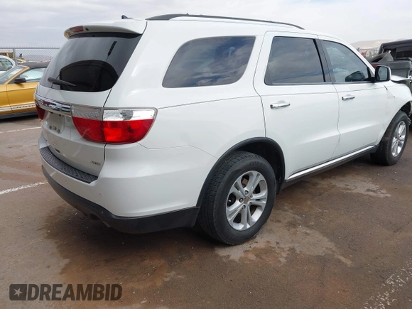 2013 Dodge Durango Crew with VIN 1C4RDHDG0DC535397, listed as a IAAI auction lot 41036306 with 163,571 mi miles. Bid and sale history available at carsss.com. Image 4.