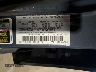 2021 Mazda 3 Premium Plus with VIN JM1BPBNYXM1311594, listed as a Copart auction lot 61470625 with 89,254 mi miles and Salvage title. Bid and sale history available at DreamBid. Image 12.
