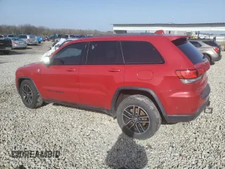 2017 Jeep Grand Cherokee Trailhawk with VIN 1C4RJFLT0HC667691, listed as a Copart auction lot 42041705 with 129,757 mi miles and Salvage title. Bid and sale history available at DreamBid. Image 2.