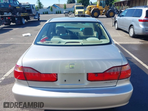 1999 Honda Accord LX with VIN JHMCG5545XC028563, listed as a IAAI auction lot 42461054 with 212,100 mi miles and . Bid and sale history available at DreamBid. Image 17.