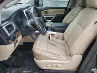 2016 Nissan Titan SL with VIN 1N6BA1F48GN511567, listed as a Copart auction lot 57864775 with 141,545 mi miles and Salvage title. Bid and sale history available at DreamBid. Image 7.