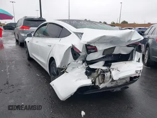 2020 Tesla Model 3 Standard Range Plus with VIN 5YJ3E1EA2LF740225, listed as a IAAI auction lot 41781554 with 46,703 mi miles. Bid and sale history available at carsss.com. Image 13.