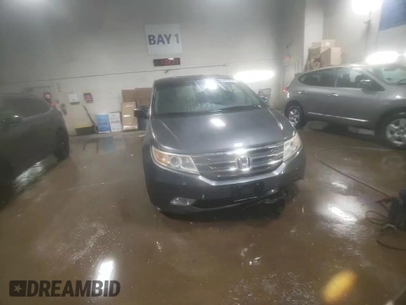 2012 Honda Odyssey EX-L with VIN 5FNRL5H69CB143572, listed as a Copart auction lot 48614255 with 114,490 mi miles and Salvage Title. Bid and sale history available at carsss.com. Image 14.