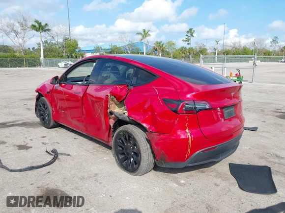 2023 Tesla Model Y Long Range with VIN 7SAYGDEE1PA154996, listed as a IAAI auction lot 41472595 with 24,861 mi miles and . Bid and sale history available at DreamBid. Image 3.