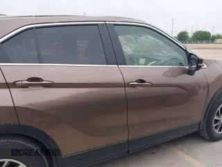 2020 Mitsubishi Eclipse Cross ES z VIN JA4AS3AAXLZ021438, wystawiony jako IAAI lot #41900181 z przebiegiem 91 306 mil mil oraz . Historia ofert i sprzedaży dostępna na DreamBid. Obrazek 13.