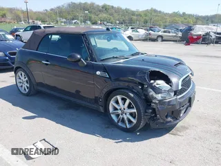 2012 MINI Convertible S z VIN WMWZP3C52CT550179, wystawiony jako IAAI lot #42046285 z przebiegiem 87 718 mil mil oraz . Historia ofert i sprzedaży dostępna na DreamBid. Obrazek 1.