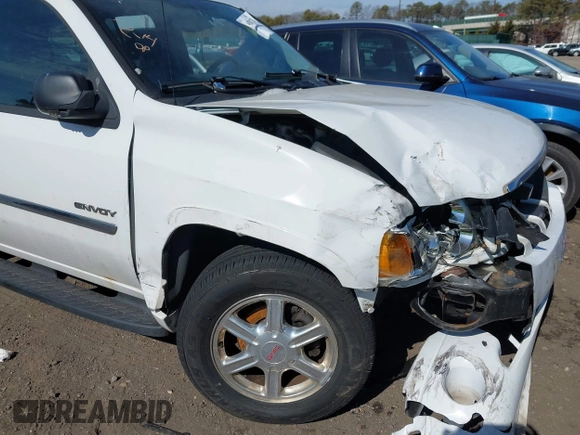 2006 GMC Envoy SLE with VIN 1GKDT13S662355509, listed as a IAAI auction lot 41628732 with 187,635 mi miles. Bid and sale history available at carsss.com. Image 12.