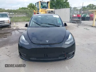 2023 Tesla Model Y Long Range with VIN 7SAYGDEE2PA044328, listed as a IAAI auction lot 42427625 with 41,324 mi miles and . Bid and sale history available at DreamBid. Image 12.
