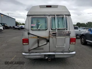 1992 Chevrolet Chevy Van z VIN 1GBEG25K2N7130047, wystawiony jako Copart lot #68682724 z przebiegiem 143 585 mil mil oraz Szkody całkowita. Historia ofert i sprzedaży dostępna na DreamBid. Obrazek 6.