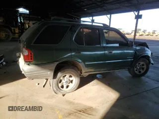 2002 Isuzu Rodeo z VIN 4S2CK58DX24320793, wystawiony jako Copart lot #46357065 z przebiegiem 180 306 mil mil oraz Szkody całkowita. Historia ofert i sprzedaży dostępna na DreamBid. Obrazek 3.