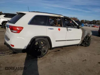 2013 Jeep Grand Cherokee Overland with VIN 1C4RJFCG5DC639401, listed as a Copart auction lot 79003094 with 0 mi miles and Salvage Title. Bid and sale history available at carsss.com. Image 3.