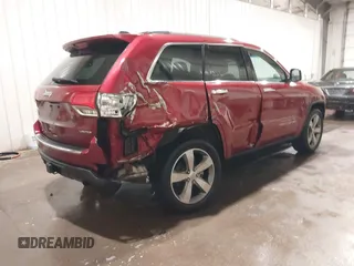 2014 Jeep Grand Cherokee Limited with VIN 1C4RJFBT1EC139798, listed as a IAAI auction lot 41772069 with 122,282 mi miles and . Bid and sale history available at DreamBid. Image 4.