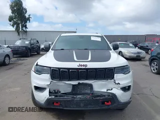 2018 Jeep Grand Cherokee Trailhawk with VIN 1C4RJFLT2JC137793, listed as a IAAI auction lot 41697299 with 149,100 mi miles and . Bid and sale history available at DreamBid. Image 12.