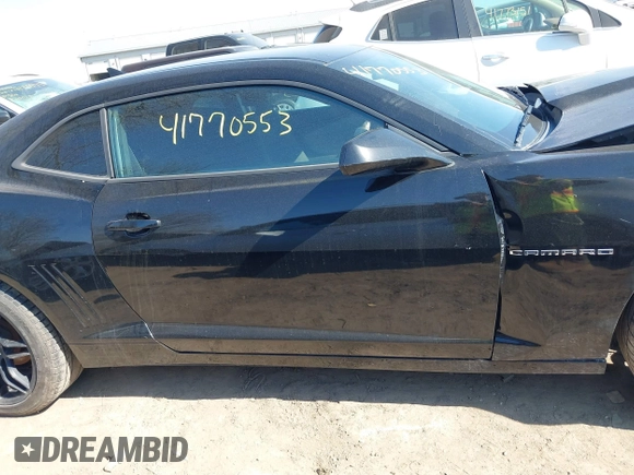 2014 Chevrolet Camaro LS z VIN 2G1FA1E36E9246671, wystawiony jako IAAI lot #41770553 z przebiegiem 170 121 mil mil oraz . Historia ofert i sprzedaży dostępna na DreamBid. Obrazek 14.