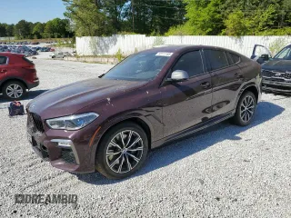 2021 BMW X6 M50i z VIN 5UXCY8C0XM9G19675, wystawiony jako Copart lot #53111185 z przebiegiem Nie podano mil oraz Szkoda całkowita • Salvage title. Historia ofert i sprzedaży dostępna na DreamBid. Obrazek 1.