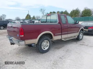 1997 Ford F-150 XL with VIN 1FTEX18L5VNC45344, listed as a IAAI auction lot 41690852 with 205,766 mi miles. Bid and sale history available at carsss.com. Image 4.