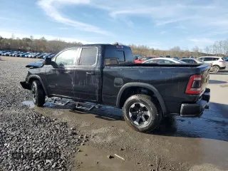2019 Ram 1500 Rebel z VIN 1C6SRFET5KN580766, wystawiony jako Copart lot #54126805 z przebiegiem 129 515 mil mil oraz Szkoda całkowita • Salvage title. Historia ofert i sprzedaży dostępna na DreamBid. Obrazek 2.