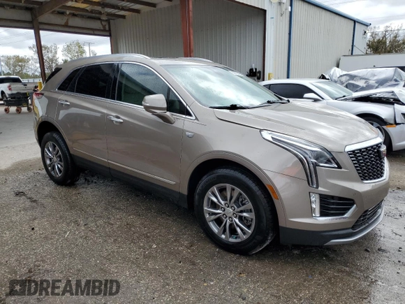 2023 Cadillac XT5 FWD Premium Luxury with VIN 1GYKNCRS2PZ178623, listed as a Copart auction lot 85016494 with 23,336 mi miles and Non Repairable. Bid and sale history available at carsss.com. Image 4.