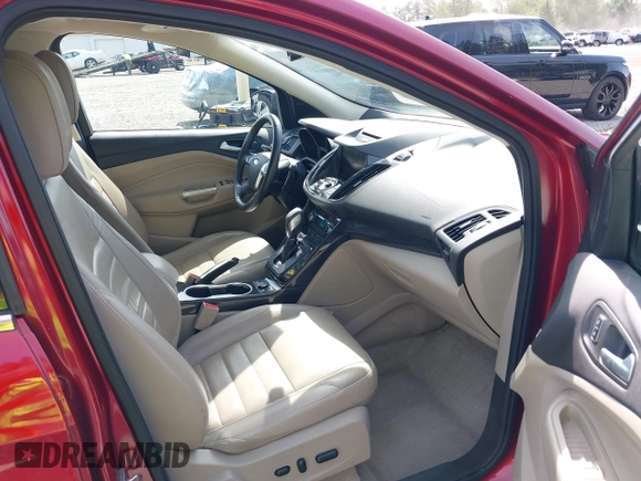2015 Ford Escape Titanium with VIN 1FMCU9J93FUB28037, listed as a IAAI auction lot 42432345 with 133,242 mi miles and . Bid and sale history available at DreamBid. Image 5.