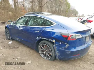 2020 Tesla Model 3 Standard Range Plus with VIN 5YJ3E1EA1LF658521, listed as a IAAI auction lot 41804722 with 83,248 mi miles and . Bid and sale history available at DreamBid. Image 6.