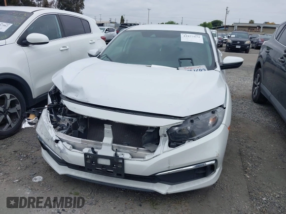 2020 Honda Civic LX with VIN 2HGFC2F64LH593100, listed as a IAAI auction lot 41877572 with 76,713 mi miles and . Bid and sale history available at DreamBid. Image 12.