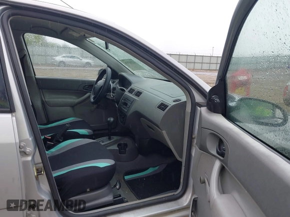 2005 Ford Focus S with VIN 1FAFP34N35W271612, listed as a IAAI auction lot 42203936 with 207,837 mi miles and . Bid and sale history available at carsss.com. Image 5.
