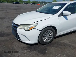 2015 Toyota Camry XLE with VIN 4T1BF1FK6FU948938, listed as a IAAI auction lot 42023487 with 107,232 mi miles. Bid and sale history available at carsss.com. Image 6.