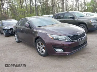 2014 Kia Optima LX with VIN 5XXGM4A72EG311392, listed as a IAAI auction lot 42082786 with 123,797 mi miles. Bid and sale history available at carsss.com. Image 1.