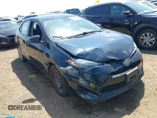 2019 Toyota Corolla L with VIN 2T1BURHE6KC185004, listed as a IAAI auction lot 42105629 with 111,907 mi miles. Bid and sale history available at carsss.com. Image 1.