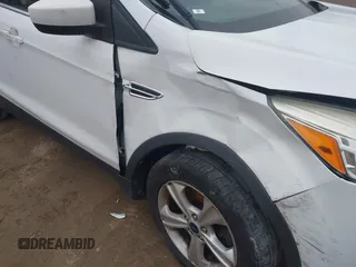 2014 Ford Escape SE with VIN 1FMCU9G93EUD37963, listed as a IAAI auction lot 41178797 with 171,149 mi miles and . Bid and sale history available at DreamBid. Image 12.