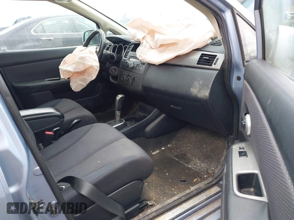 2009 Nissan Versa S with VIN 3N1BC13E49L421994, listed as a IAAI auction lot 41853889 with 133,195 mi miles and . Bid and sale history available at DreamBid. Image 5.