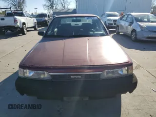1990 Toyota Camry z VIN JT2SV21E7L3411990, wystawiony jako Copart lot #88557555 z przebiegiem 335 803 mil mil oraz Szkoda całkowita • Salvage title. Historia ofert i sprzedaży dostępna na DreamBid. Obrazek 5.