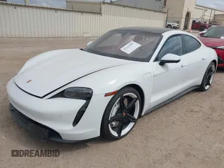 2022 Porsche Taycan z VIN WP0AA2Y10NSA12920, wystawiony jako IAAI lot #42047850 z przebiegiem 22 300 mil mil oraz . Historia ofert i sprzedaży dostępna na DreamBid. Obrazek 2.