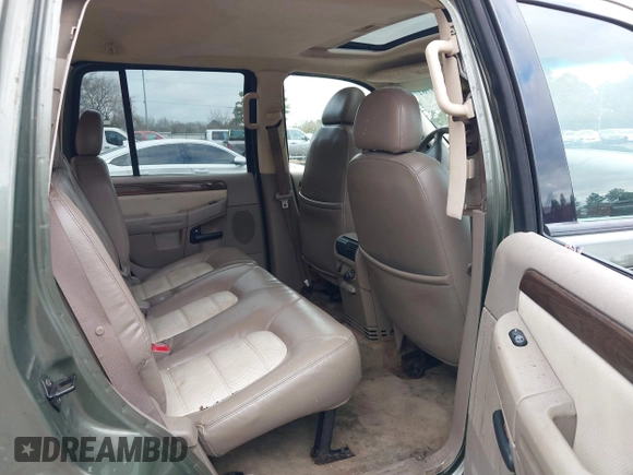 2004 Ford Explorer Eddie Bauer z VIN 1FMZU74WX4UA54743, wystawiony jako IAAI lot #41190762 z przebiegiem 168 093 mil mil oraz . Historia ofert i sprzedaży dostępna na DreamBid. Obrazek 8.