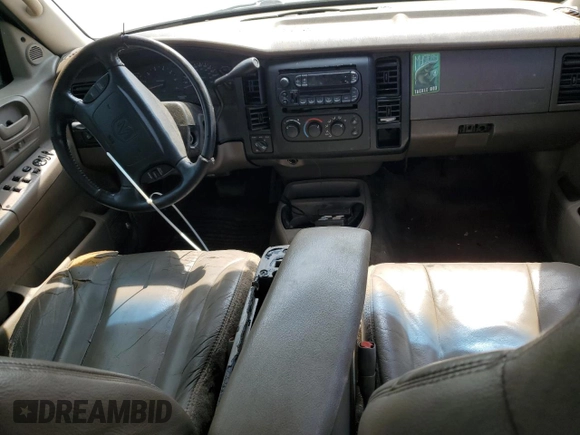 2003 Dodge Dakota z VIN 1D7HG38Z13S220152, wystawiony jako Copart lot #54314515 z przebiegiem Nie podano mil oraz Szkoda całkowita • Salvage title. Historia ofert i sprzedaży dostępna na DreamBid. Obrazek 8.