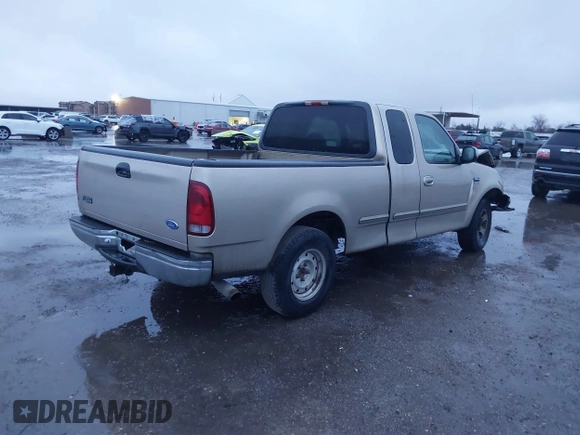 1999 Ford F-150 XL with VIN 1FTRX17L1XNA06282, listed as a IAAI auction lot 41545503 with 234,817 mi miles. Bid and sale history available at carsss.com. Image 4.
