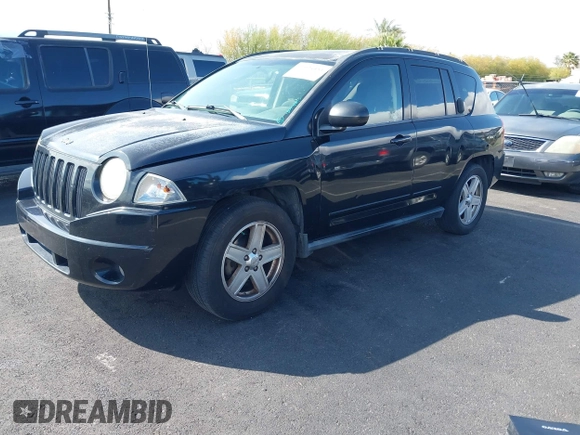 2010 Jeep Compass North Edition with VIN 1J4NF4FB3AD504356, listed as a IAAI auction lot 41924451 with 157,066 mi miles. Bid and sale history available at carsss.com. Image 2.