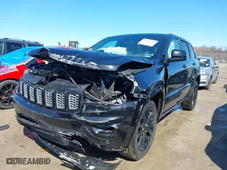 2021 Jeep Grand Cherokee Freedom with VIN 1C4RJFAG5MC704072, listed as a IAAI auction lot 41928963 with 65,073 mi miles. Bid and sale history available at carsss.com. Image 2.