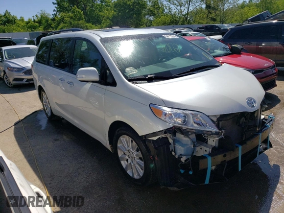 2014 Toyota Sienna XLE with VIN 5TDYK3DC6ES427920, listed as a Copart auction lot 54075594 with 127,018 mi miles and Salvage title. Bid and sale history available at DreamBid. Image 4.