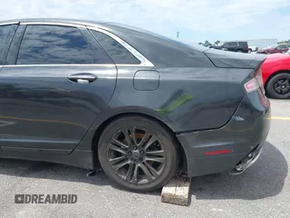 2013 Lincoln MKZ z VIN 3LN6L2GK1DR800859, wystawiony jako IAAI lot #42347695 z przebiegiem 193 300 mil mil oraz . Historia ofert i sprzedaży dostępna na DreamBid. Obrazek 14.