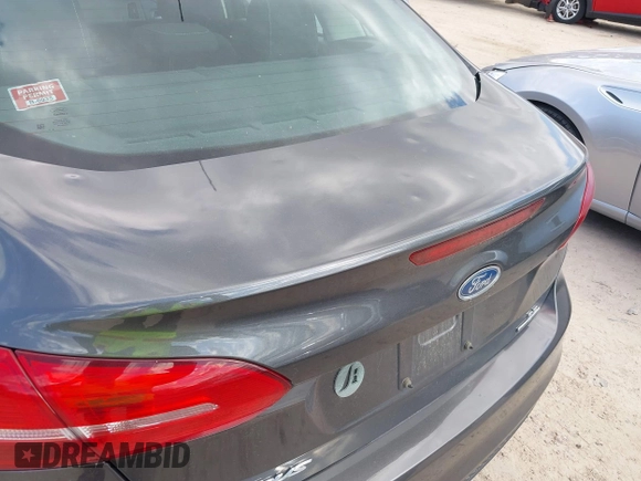 2016 Ford Focus SE with VIN 1FADP3F22GL288268, listed as a IAAI auction lot 42149474 with 78,487 mi miles and . Bid and sale history available at carsss.com. Image 6.